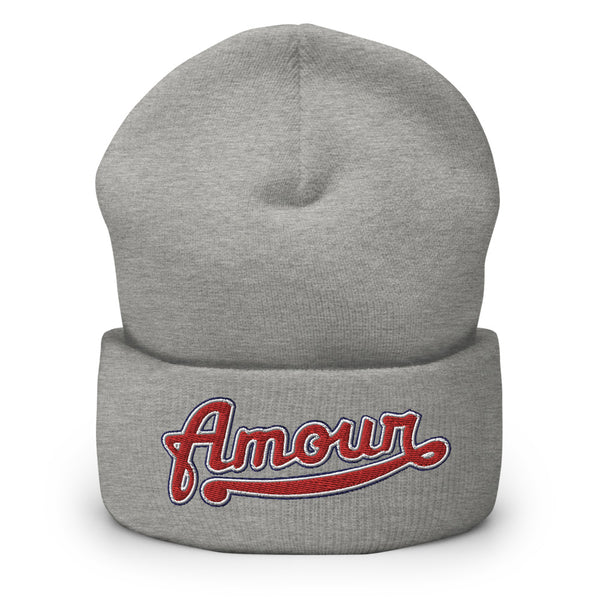 A men’s light grey beanie features a professionally embroidered, original “Amour” design by Christian Clothing Brand - Loves Everywhere