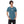 Load image into Gallery viewer, A man is wearing a teal Short Sleeve T-shirt featuring an embroidered, original “Love” design by Christian Shirt Company - Loves Everywhere