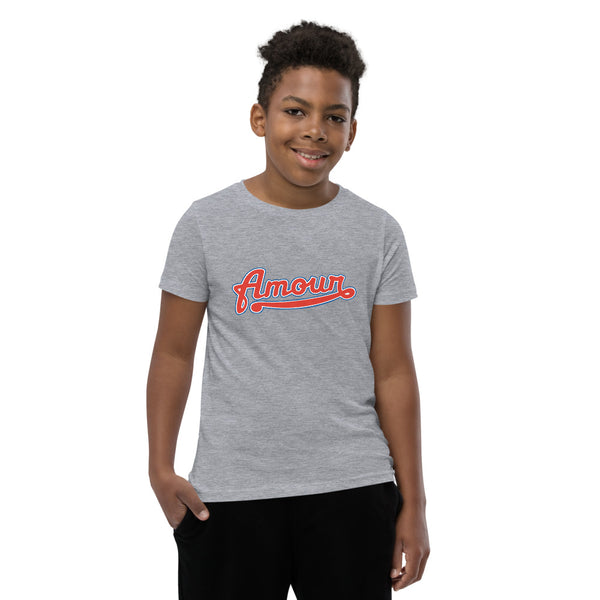 A young man is wearing an original, embroidered Christian T Shirt “Love” design on a grey short sleeve crew neck shirt by Christian Clothing Brand, Loves Everywhere