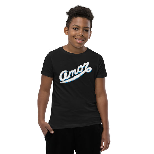 A boy is wearing an original, printed Christian T Shirt design on a black short sleeve crew neck shirt by Christian Clothing Brand, Loves Everywhere