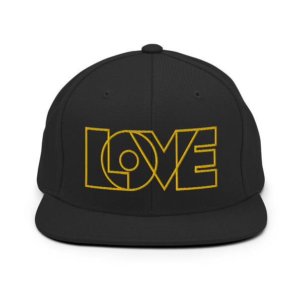 A black snapback hat features an embroidered and original “Love” design by Christian Apparel Company - Loves Everywhere