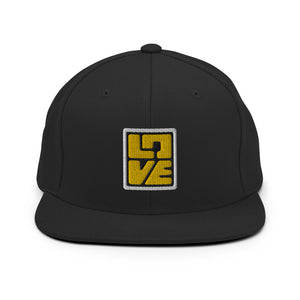 A black snapback hat features an embroidered and original “Love” design by Christian Clothing Brand - Loves Everywhere