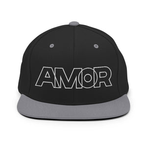 A black and silver snapback hat features an embroidered and original “Love” design by Christian Hat Company - Loves Everywhere