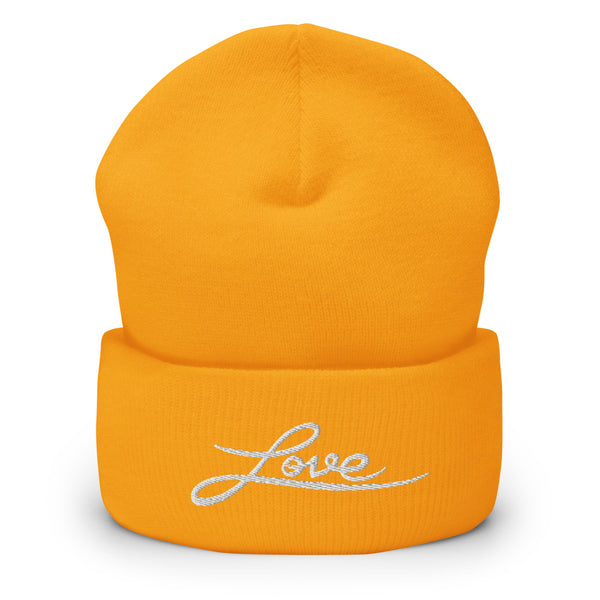 A women’s cuffed, yellow beanie features a professionally embroidered, original “Love” design by Christian Hat Company - Loves Everywhere