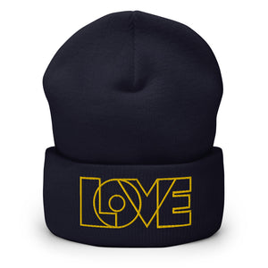 A women’s cuffed navy blue beanie features a professionally embroidered, original “Love” design by Christian Hat Company - Loves Everywhere