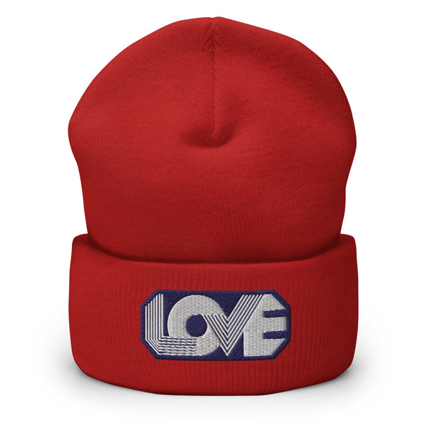 A men’s red beanie features a professionally embroidered, original “Love” design by Christian Beanie Brand - Loves Everywhere 