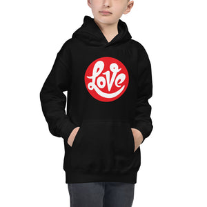 A boy is wearing an original, printed Christian Hoodie featuring a “Love” design on a black hoodie by Christian Apparel Company, Loves Everywhere