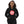 Load image into Gallery viewer, A girl is wearing a printed Hoodie featuring an original “Love” design on a black hoodie by Christian Clothing Company, Loves Everywhere
