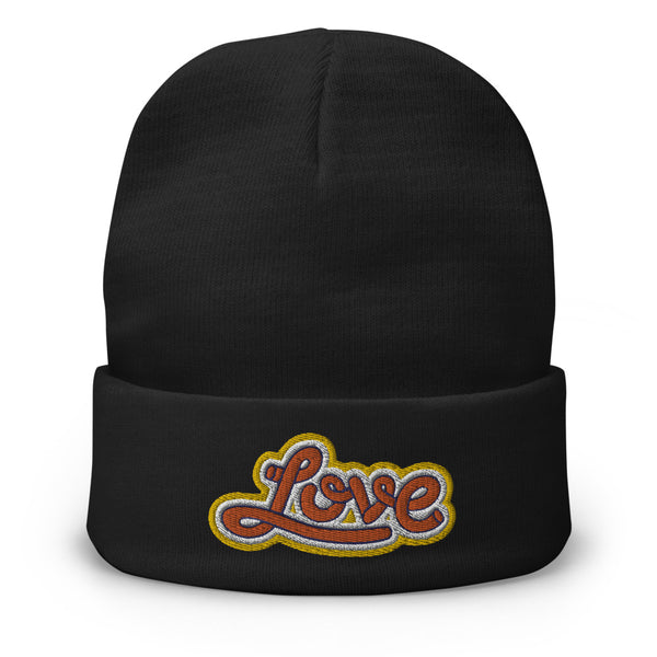 A woman’s knit, black beanie features a professionally embroidered, original “Love” design by Christian Hat Company - Loves Everywhere