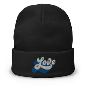 A men’s black beanie features a professionally embroidered, original “Love” design by Christian Clothing Brand - Loves Everywhere