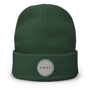 A men’s dark green beanie features a professionally embroidered, original “Love” design by Christian Clothing Brand - Loves Everywhere