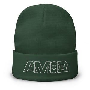 A men’s dark green beanie features a professionally embroidered, original “Love” design by Christian Clothing Brand - Loves Everywhere