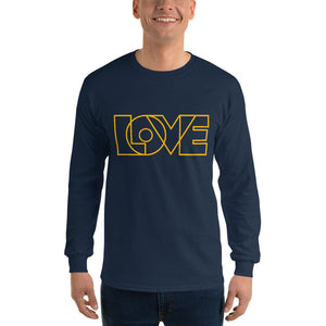 A man is wearing a navy blue Long Sleeve T-shirt featuring an original “Love” design print by Christian Shirt Company - Loves Everywhere