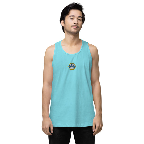 A man is wearing a pacific blue Tank Top, featuring an embroidered, original “Love” design by Christian Shirt Company - Loves Everywhere