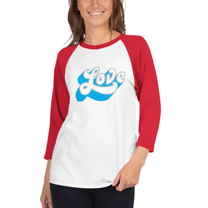 A young woman is wearing a white with red 3/4 Sleeve Raglan T Shirt, featuring an original “Love” design print by Christian Apparel Company - Loves Everywhere