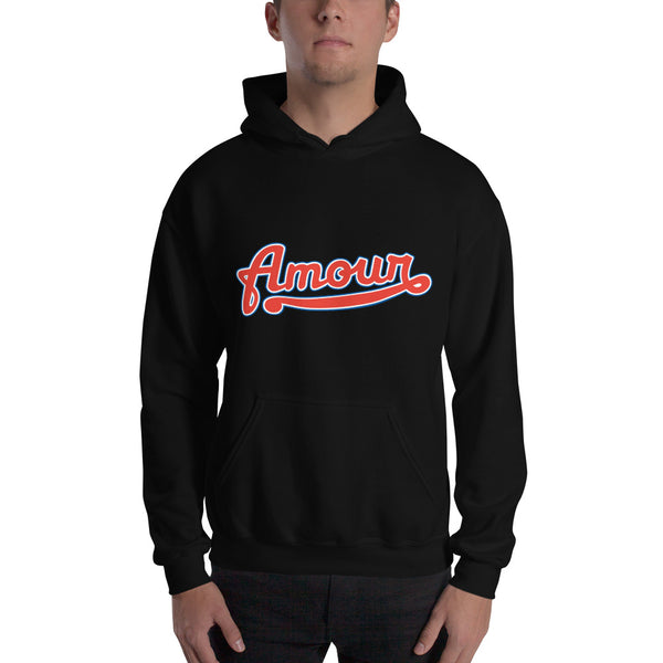 A man is wearing a black Hoodie featuring an original “Amour” design print by Christian Clothing Brand - Loves Everywhere