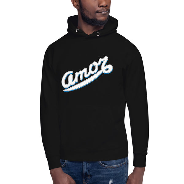 A man is wearing a black Hoodie featuring an original “Amor” design print by Christian Clothing Brand - Loves Everywhere