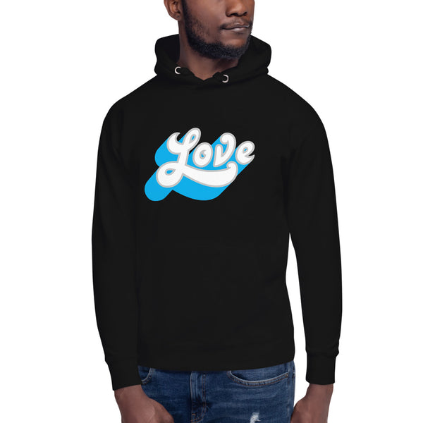 A man is wearing a black Hoodie featuring an original “Love” design print by Christian Clothing Brand - Loves Everywhere