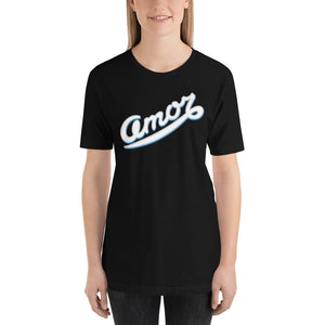 A young woman is wearing a black Crew Neck T Shirt featuring an original “Amor” design print by Christian T-Shirt Brand - Loves Everywhere