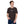 Load image into Gallery viewer, A man is wearing a brown Short Sleeve T-shirt featuring an embroidered, original “Love” design by Christian Shirt Company - Loves Everywhere
