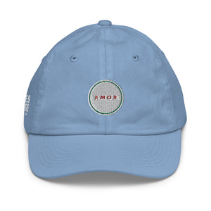 A boy’s light blue baseball cap featuring an original “Amor” design by Christian Hat Company, Loves Everywhere