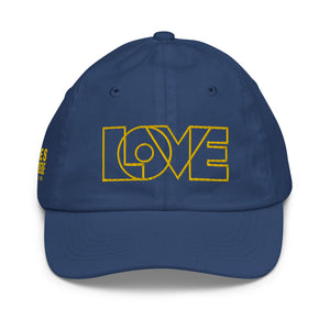 A girl’s navy blue baseball cap featuring an original “Love” design by Christian Clothing Company, Loves Everywhere