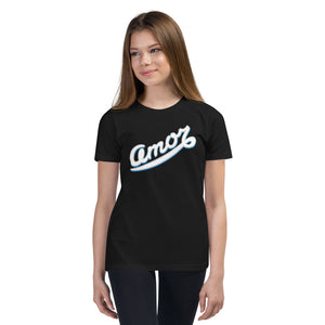 A girl is wearing an printed Christian T Shirt featuring an original “Amor” design on a black shirt by Christian Clothing Company, Loves Everywhere