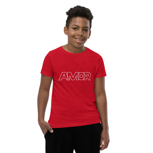 A young man is wearing an original, embroidered Christian T Shirt “Love” design on a red short sleeve crew neck shirt by Christian Clothing Brand, Loves Everywhere